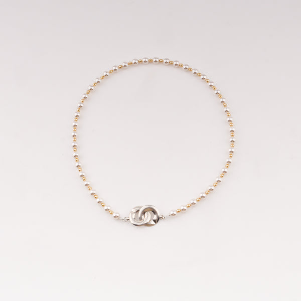 Infinity lock necklace with white and gold pearls in silver