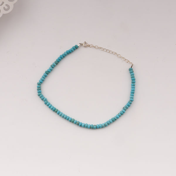 Turquoise beaded anklet with silver clasp