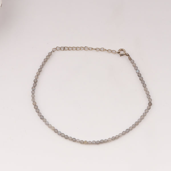 Close-up of labradorite beaded anklet with silver chain