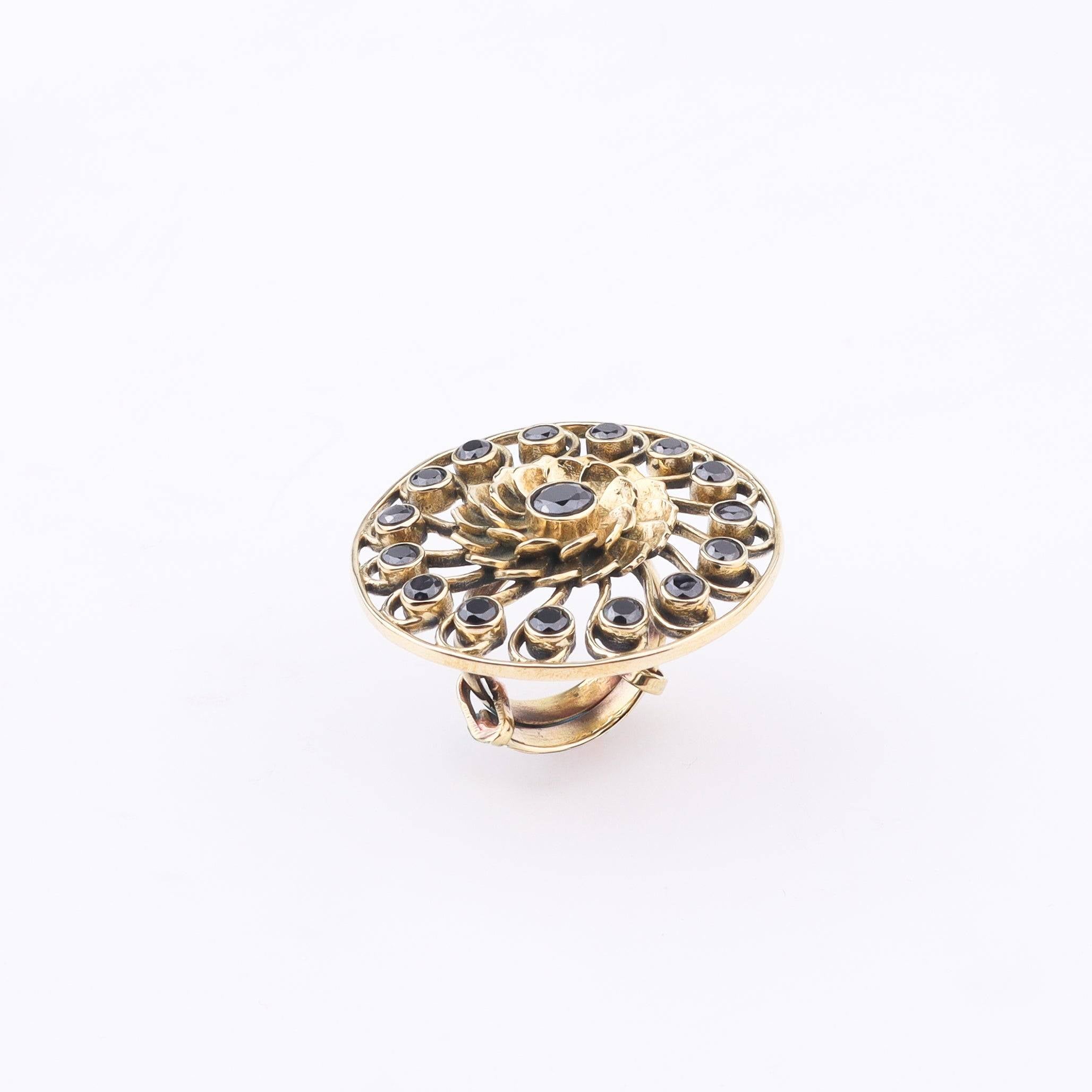 Detailed view of Brass Fashion Ring highlighting intricate motifs, textured surface, and refined brass finish