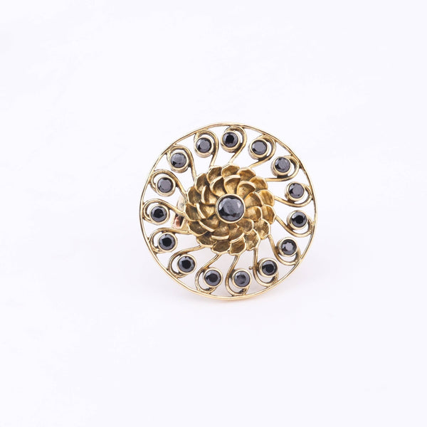 Close-up of a brass fashion ring showcasing intricate detailing, unique design, and fine craftsmanship