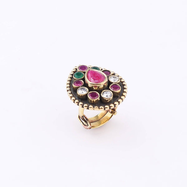 Close-up of a brass fashion ring showcasing intricate detailing, unique design, and fine craftsmanship