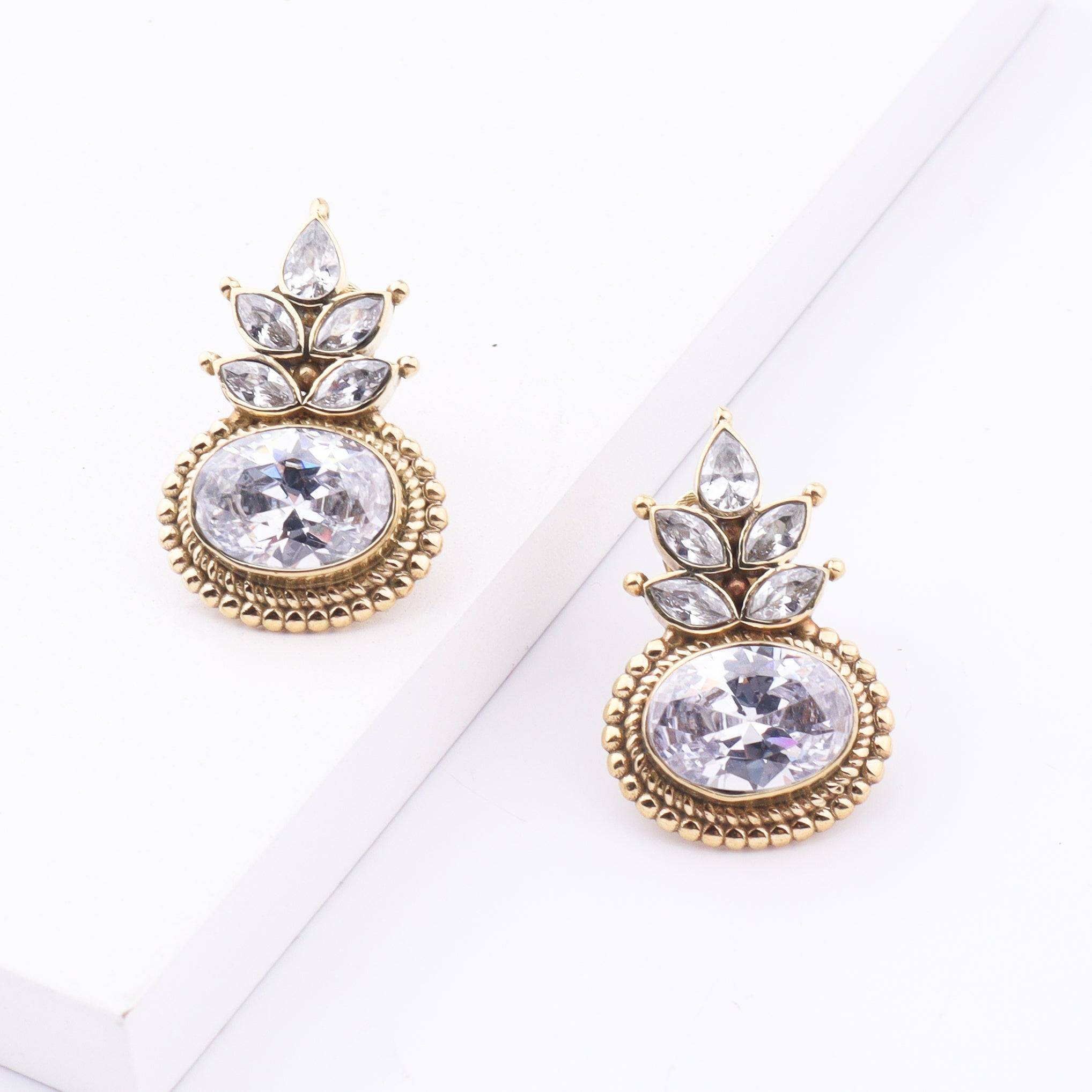 Detailed view of Brass Fashion Earrings highlighting intricate motifs, textured surface, and refined brass finish