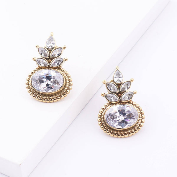 Detailed view of Brass Fashion Earrings highlighting intricate motifs, textured surface, and refined brass finish