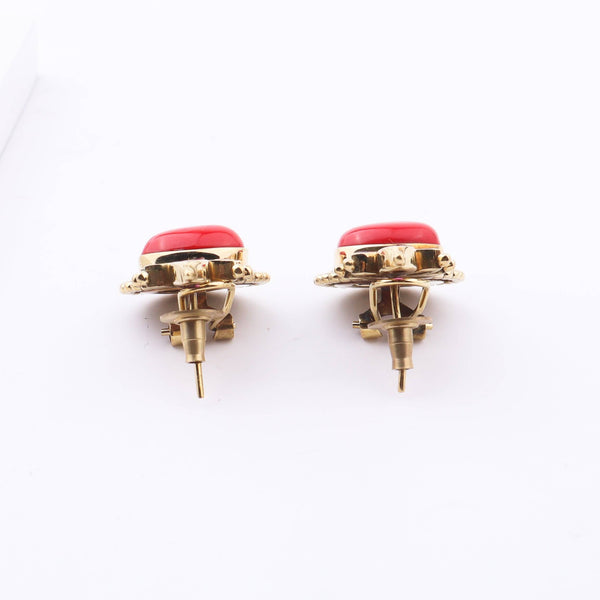 Angled view of Brass Fashion Earrings highlighting the unique silhouette, structure, and polished brass finish
