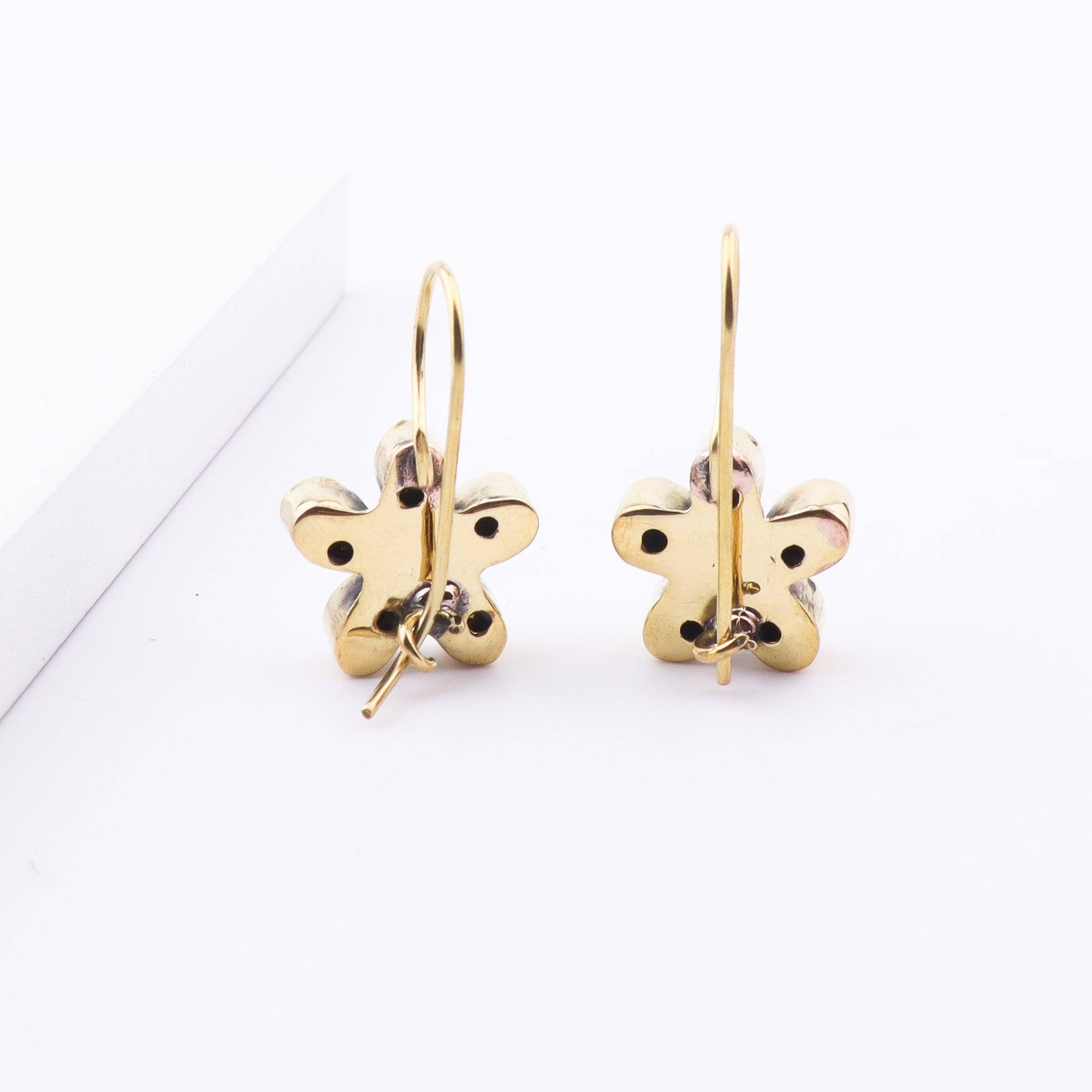 Brass Fashion Earrings showcasing the brass material, detailed craftsmanship, and smooth polished finish