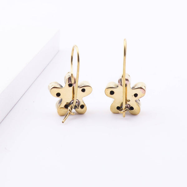 Brass Fashion Earrings showcasing the brass material, detailed craftsmanship, and smooth polished finish