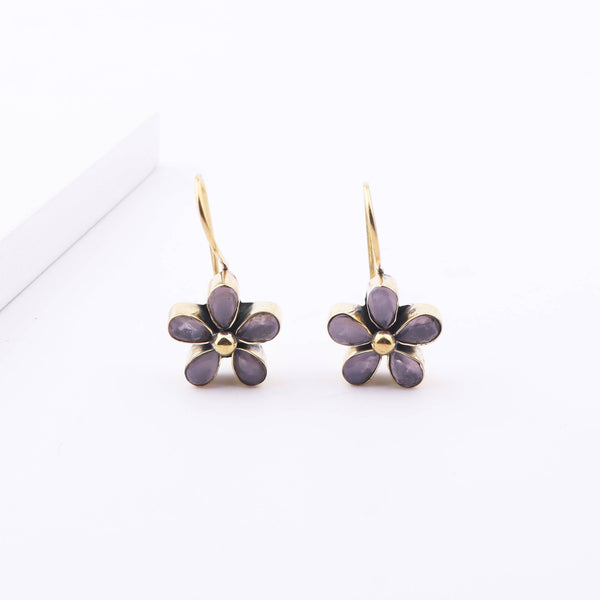 Angled view of Brass Fashion Earrings highlighting the unique silhouette, structure, and polished brass finish