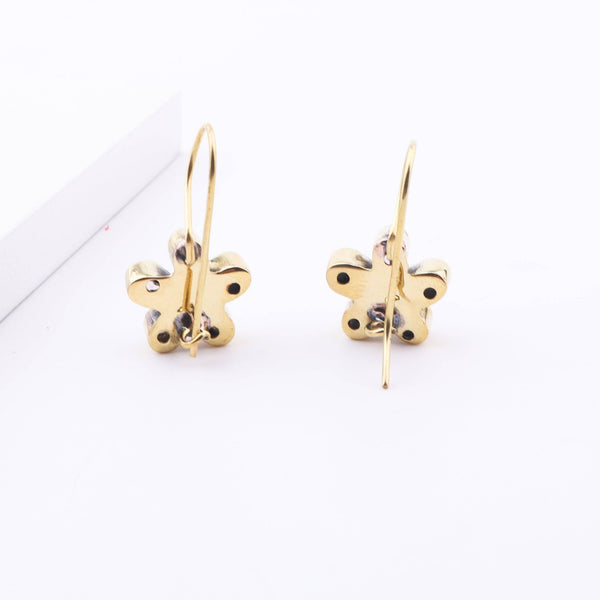 Detailed view of Brass Fashion Earrings highlighting intricate motifs, textured surface, and refined brass finish