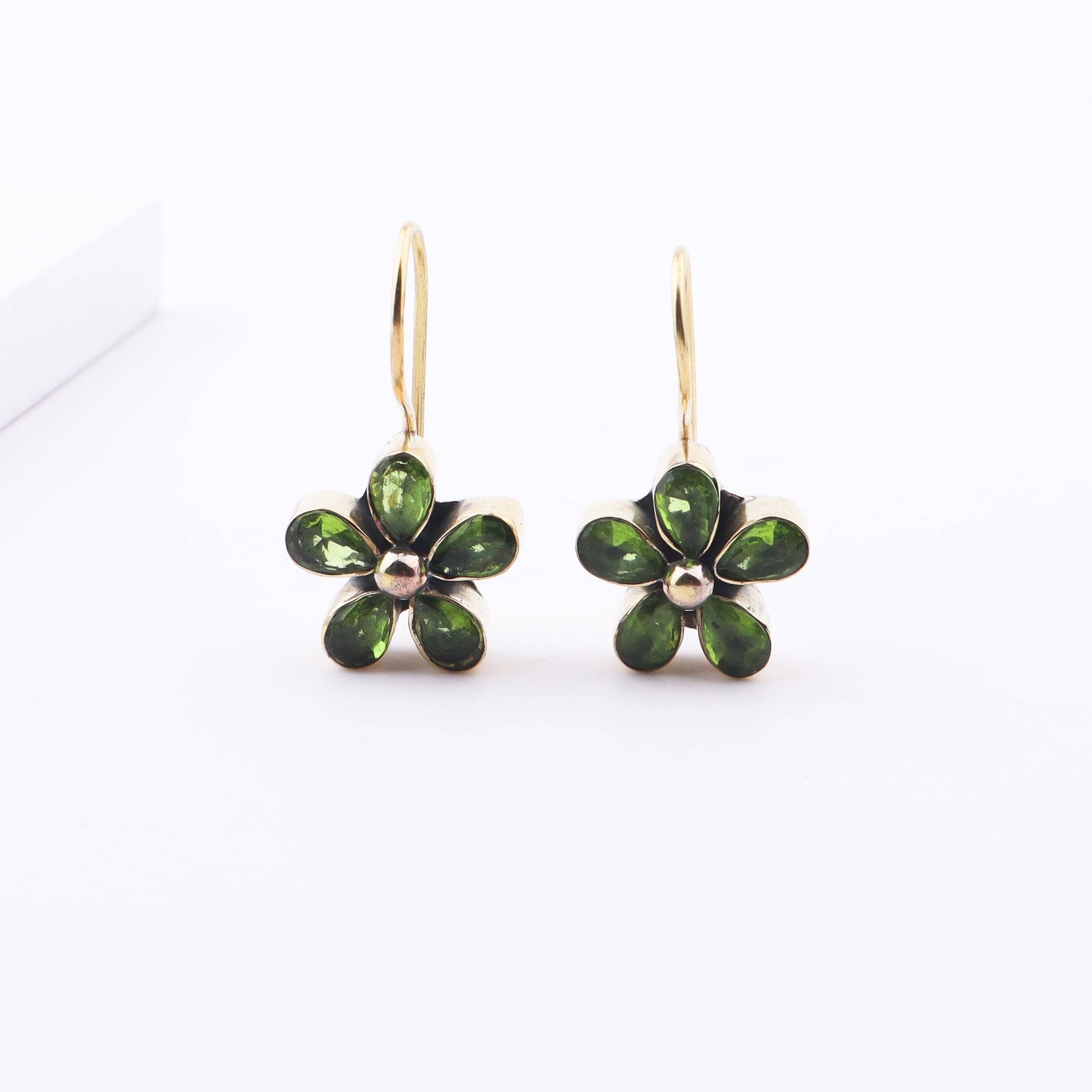 Detailed view of Brass Fashion Earrings highlighting intricate motifs, textured surface, and refined brass finish