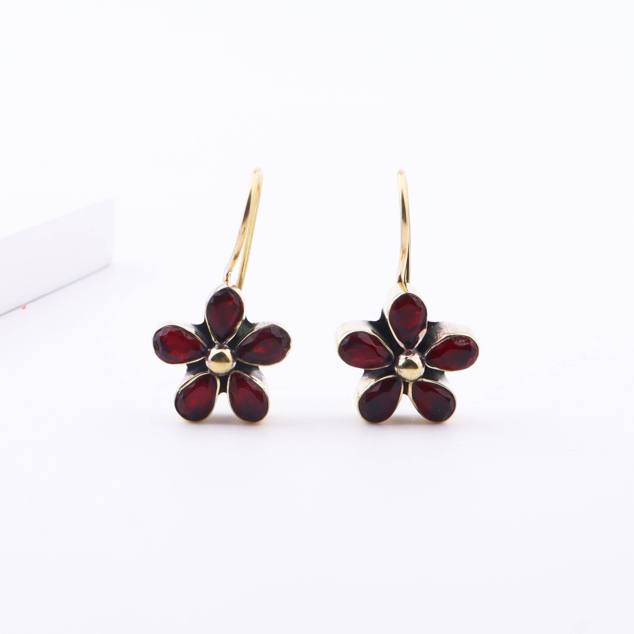 Detailed view of Brass Fashion Earrings highlighting intricate motifs, textured surface, and refined brass finish