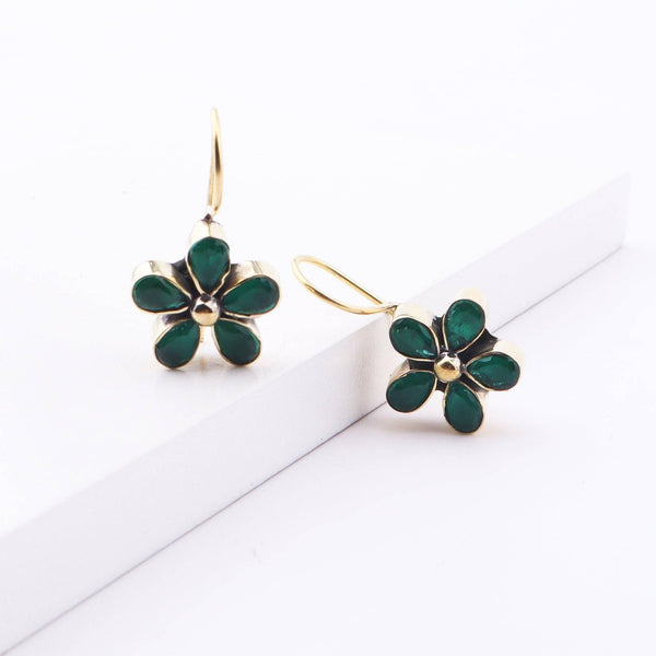 Detailed view of Brass Fashion Earrings highlighting intricate motifs, textured surface, and refined brass finish