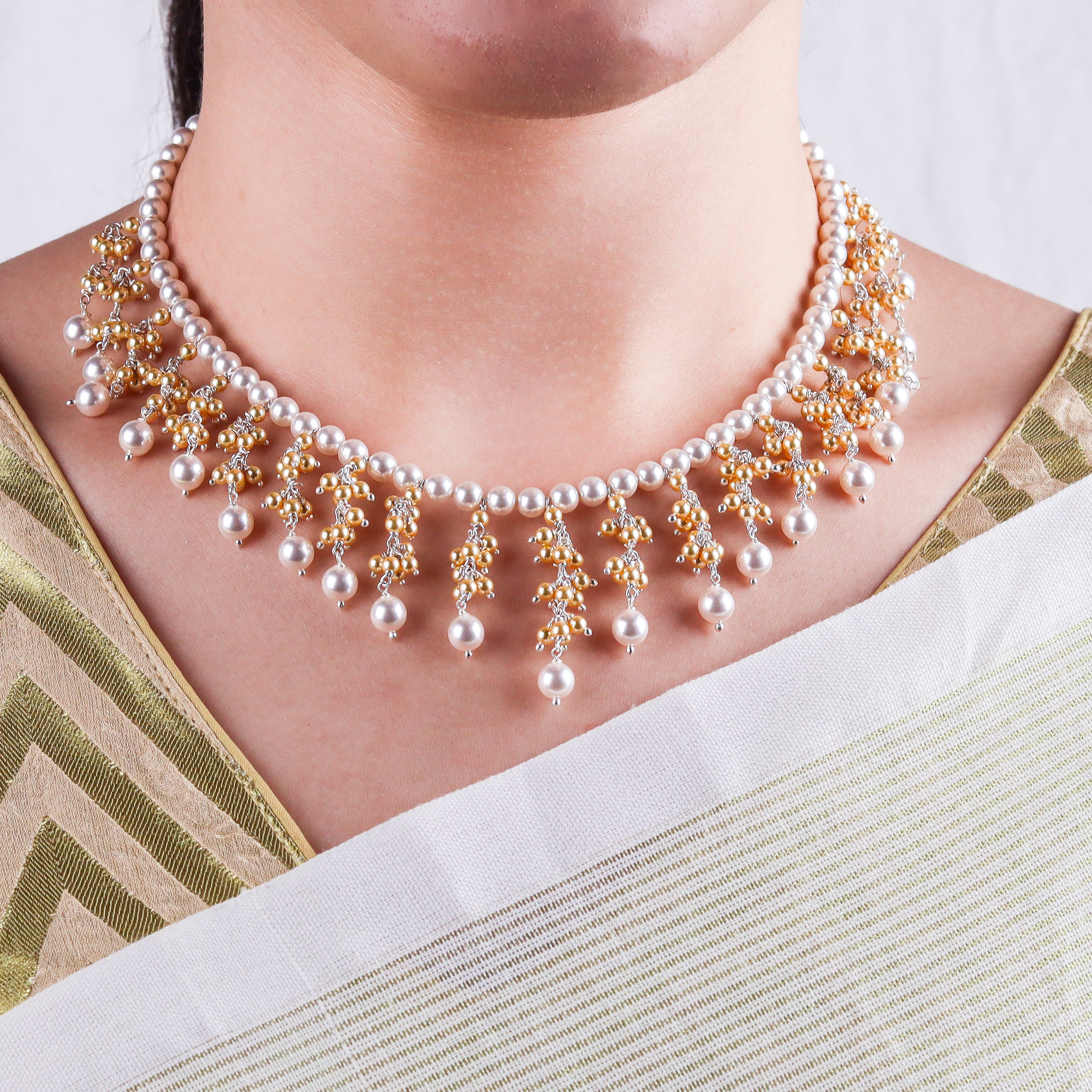 Luxe necklace with golden and white pearl bunch in 92.5 sterling silver