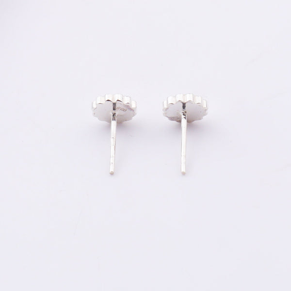 Back view of daisy enamel sterling silver stud earrings