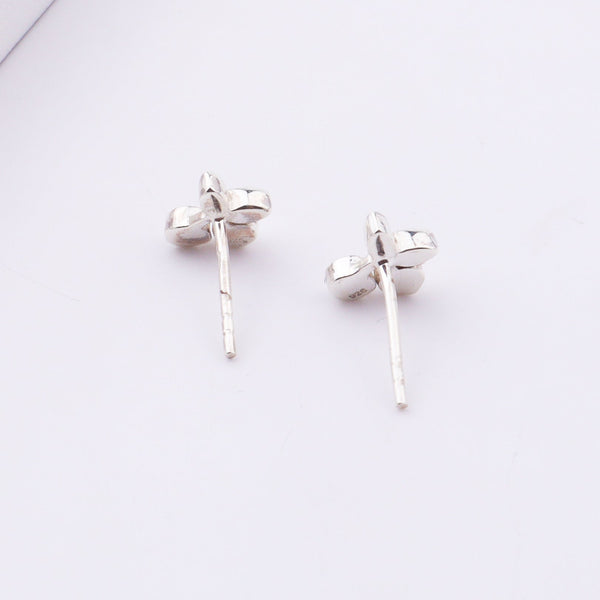 Silver cherry enamel stud earrings on white surface