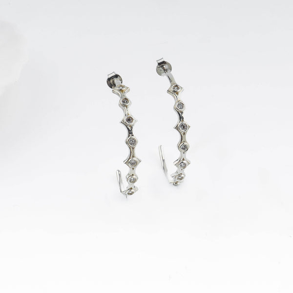 Silver diamond-shaped hoop earrings with CZ stones