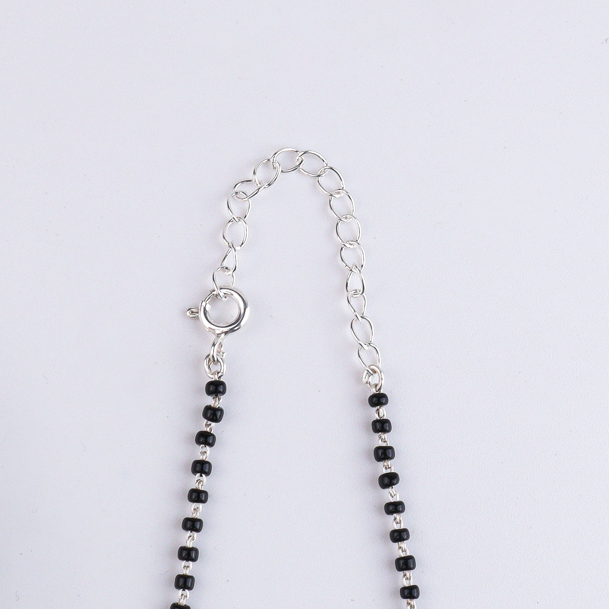 Entangled Multicolor Ganthan Silver Mangalsutra (Project Handmade)