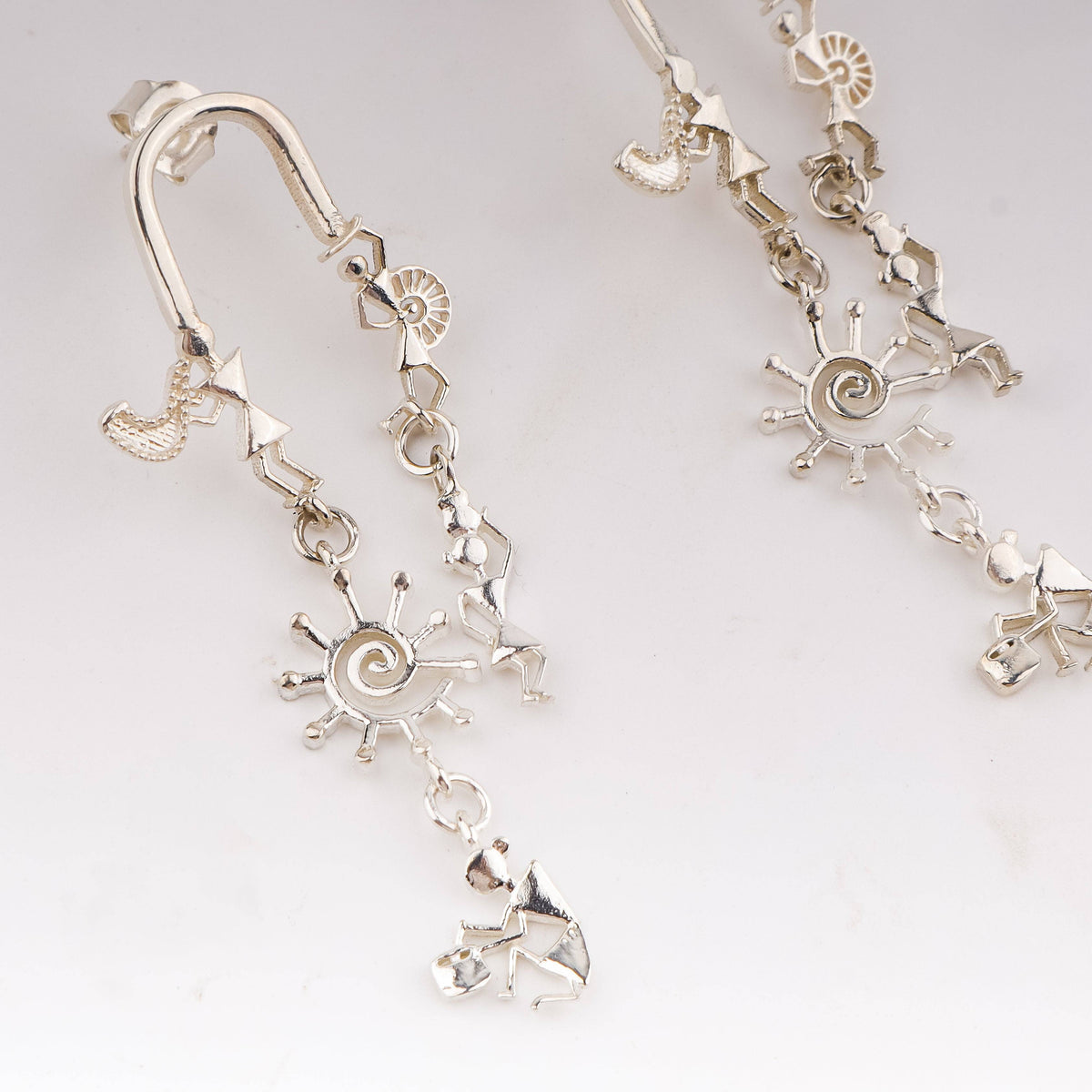 Silver earrings with Warli motifs, artisanal jewelry, 92.5 silver, cultural accessories