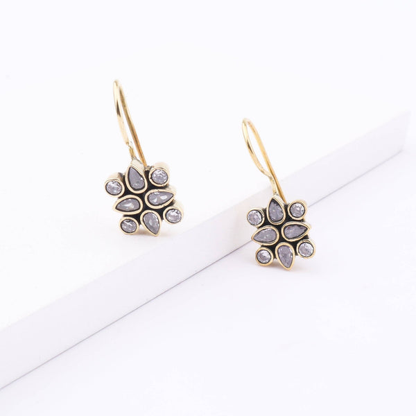 Detailed view of Brass Fashion Earrings highlighting intricate motifs, textured surface, and refined brass finish