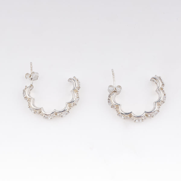Silver floral shaped hoops with CZ stones, versatile jewelry accessory