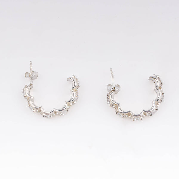 Silver floral shaped hoops with CZ stones, versatile jewelry accessory