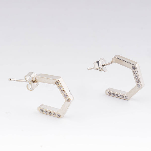 Silver hexagon hoop earrings with CZ stones