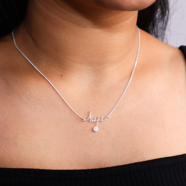 hope pendant detailing on silver necklace