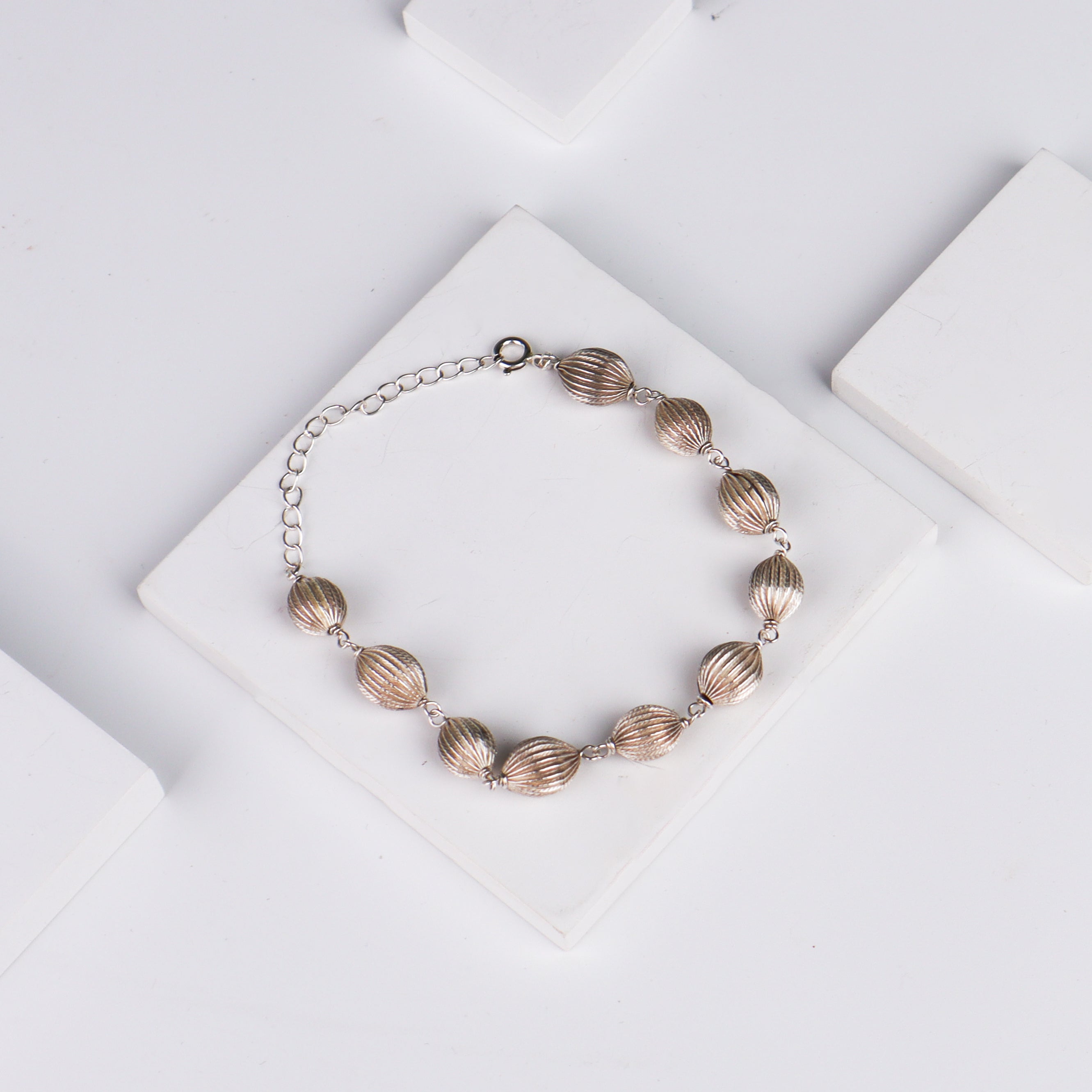Silver Oval Textured Beaded Bracelet