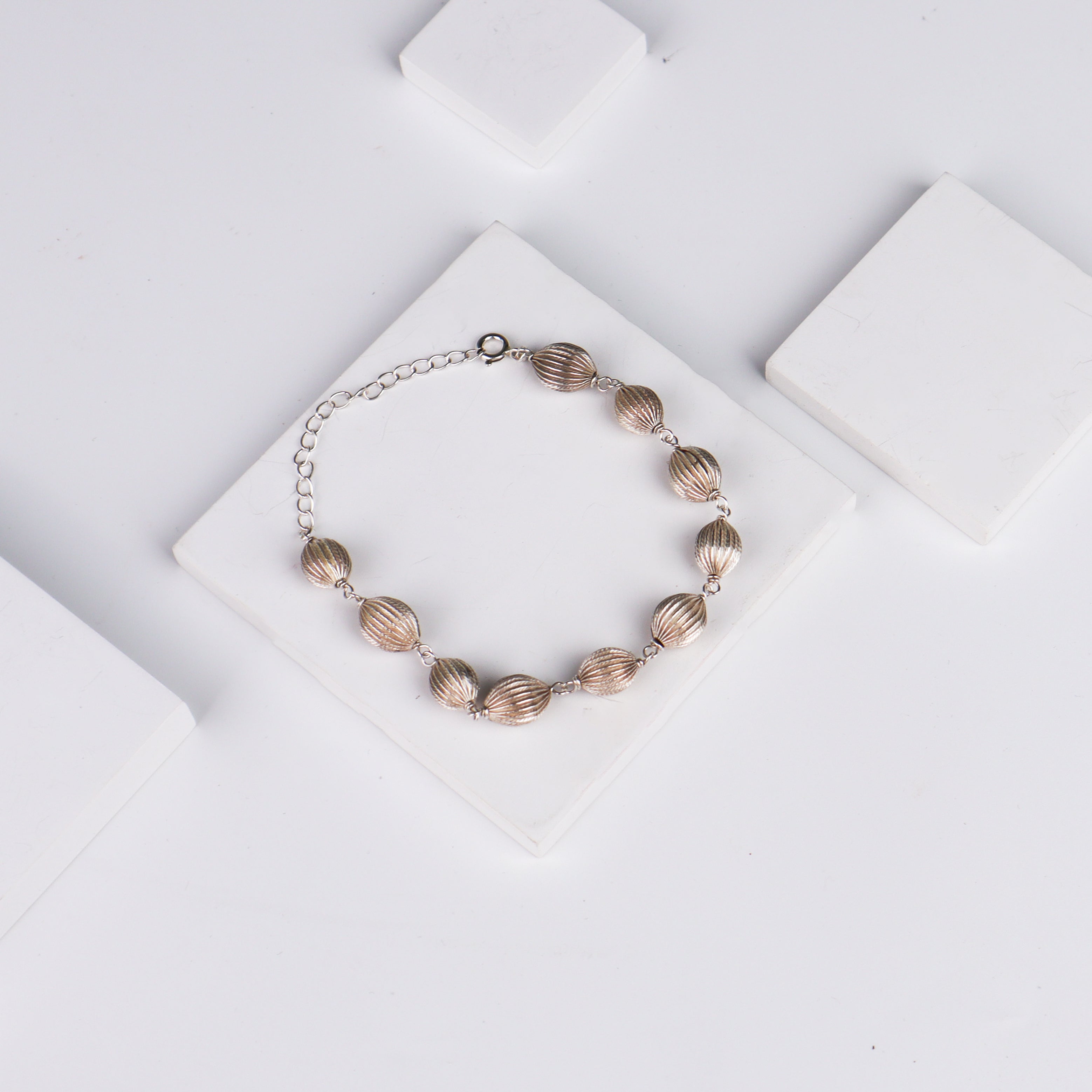 Silver Oval Textured Beaded Bracelet