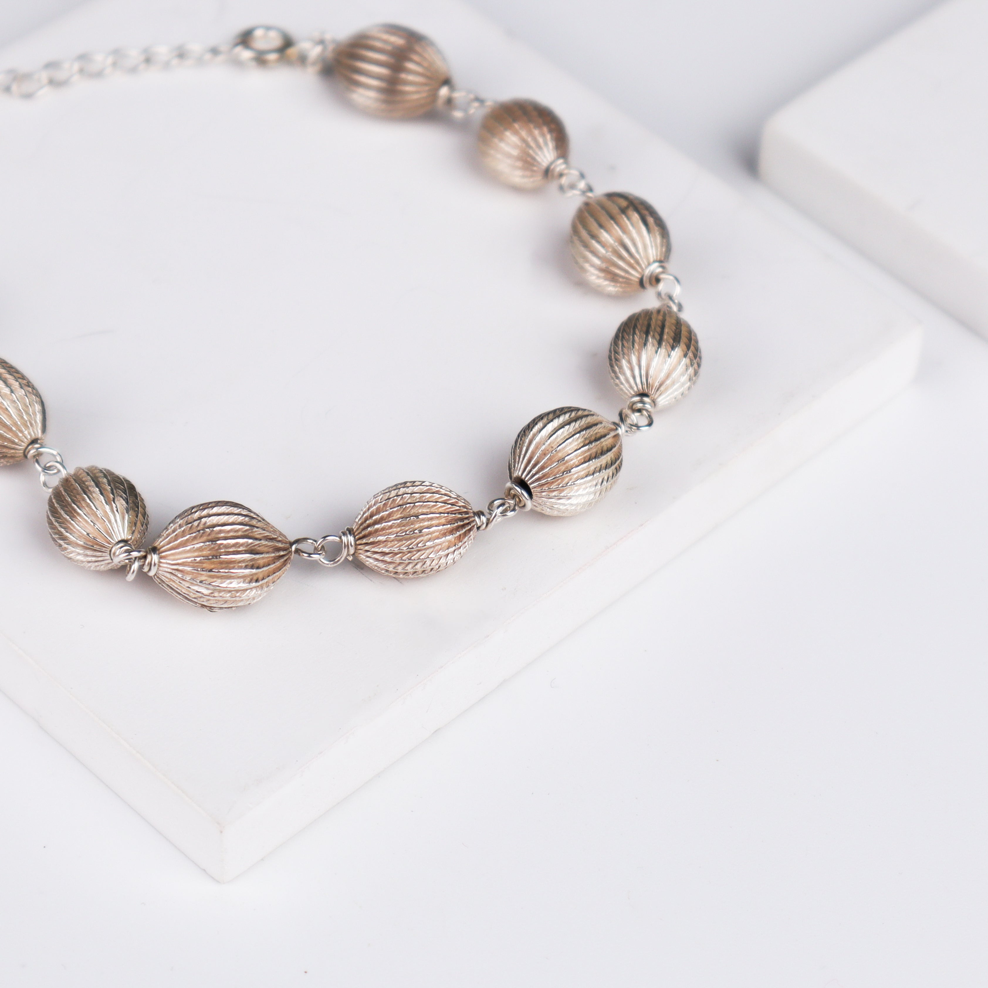 Silver Oval Textured Beaded Bracelet