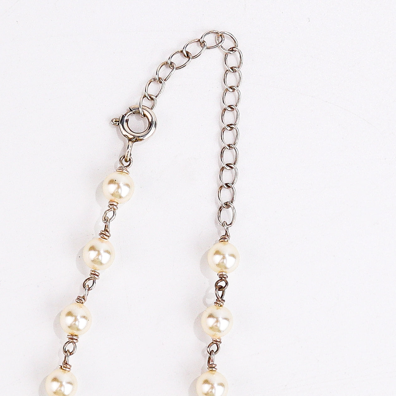 wear silver bead ganthan with pearls for traditional styling