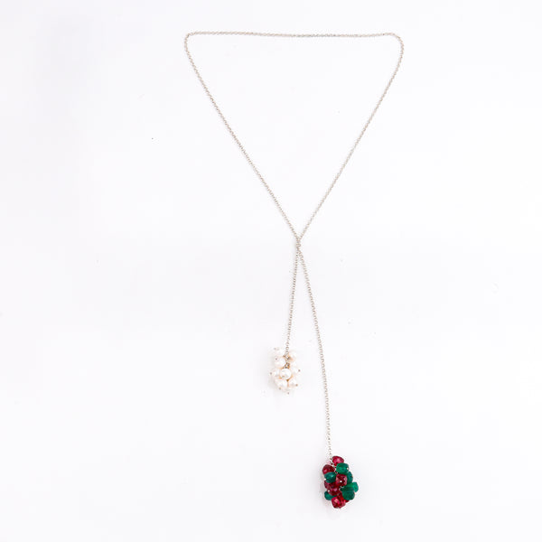 pearl cluster detailing on silver tie and wear necklace