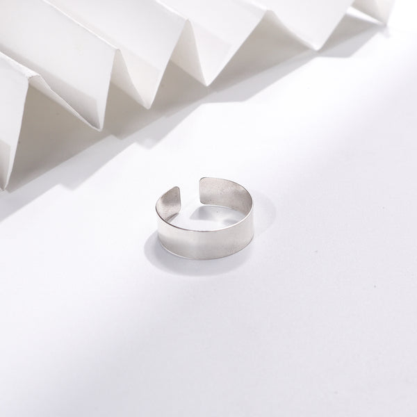 Unisex silver ring on white background