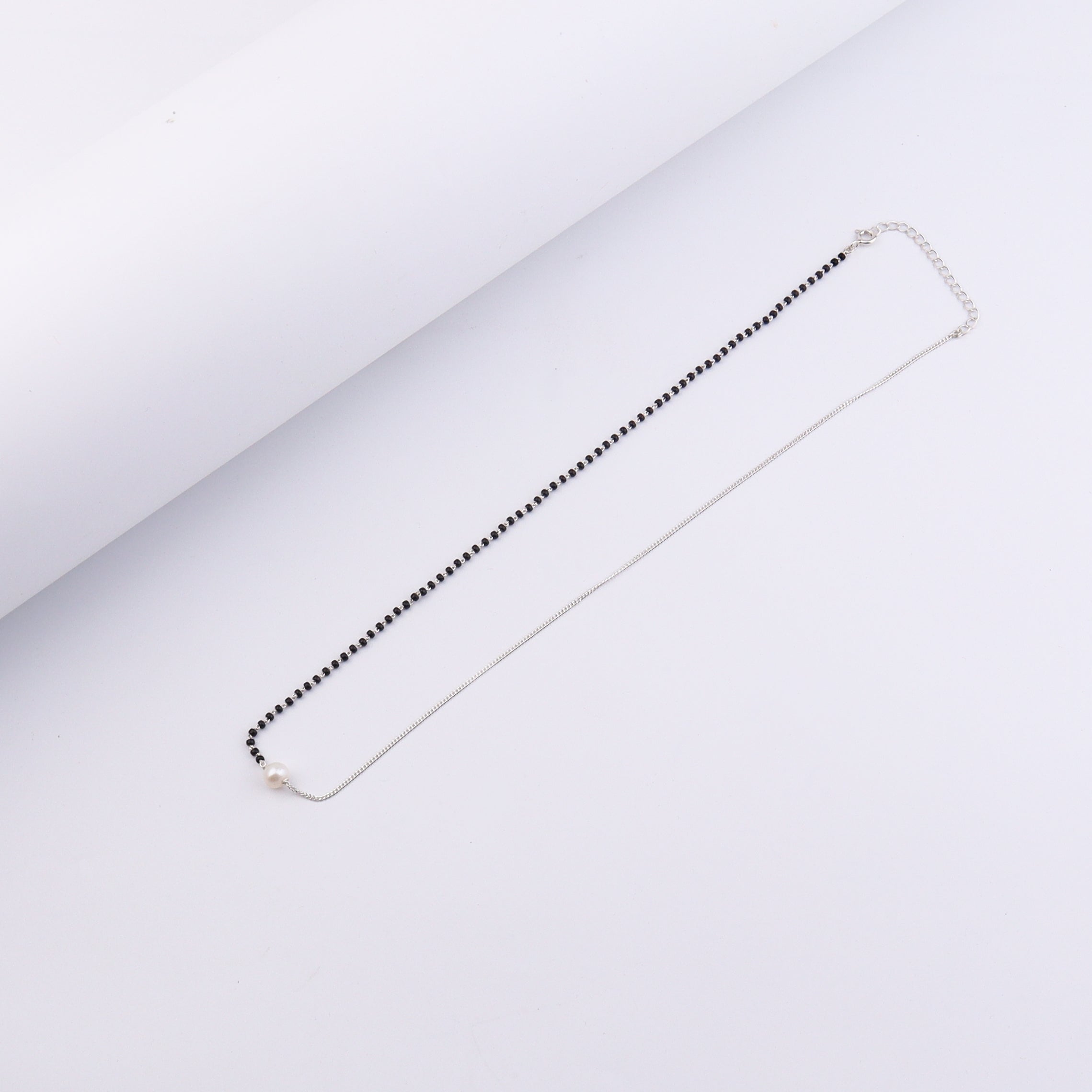 style pearl mangalsutra with modern outfit