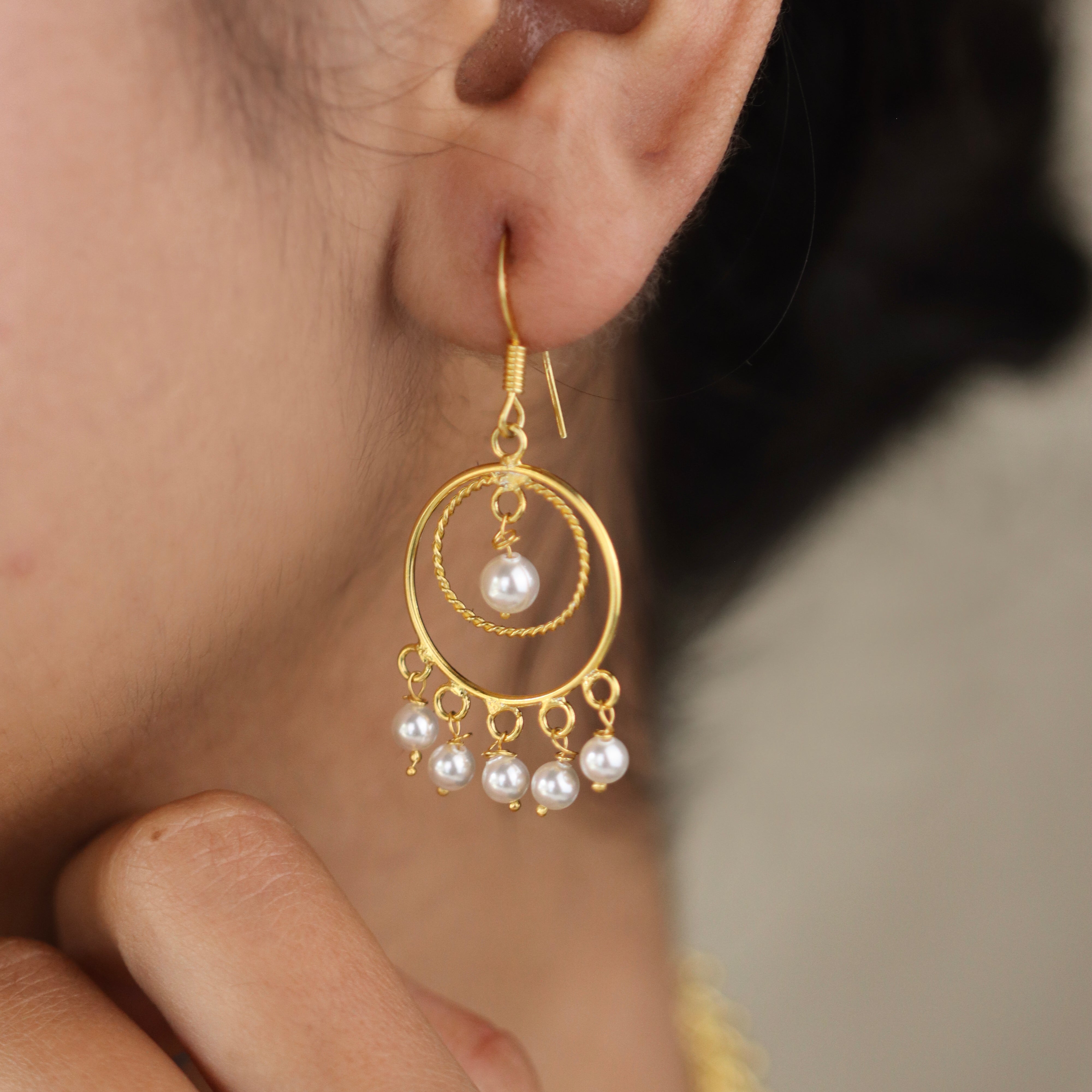 Gold plated pearl chandelier earrings with dangling pearls