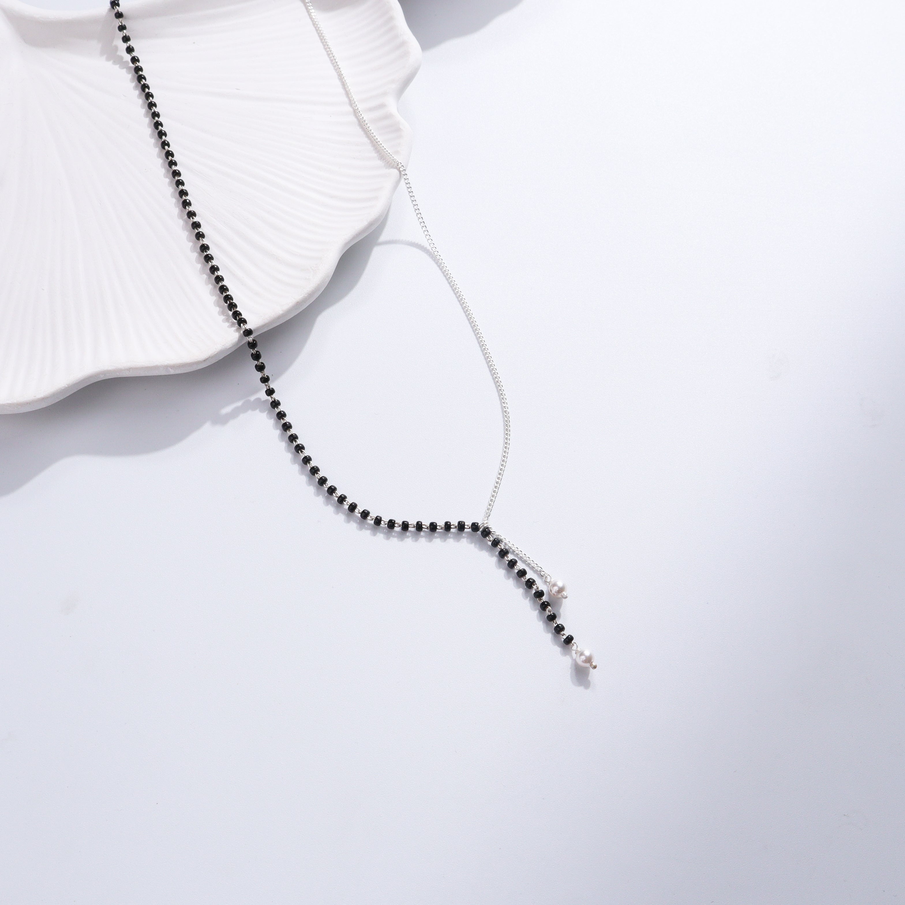 Silver and black beaded mangalsutra with pearls
