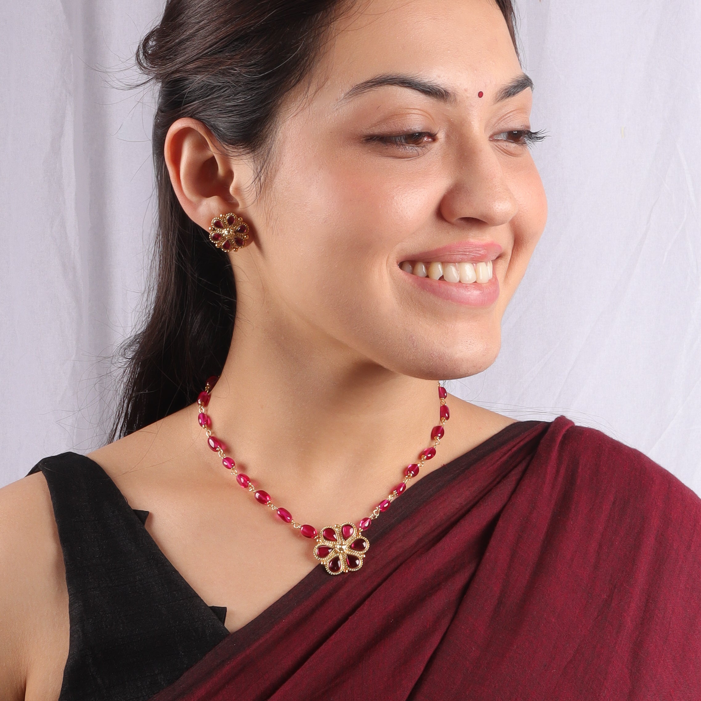 Gold plated pendant set with ruby