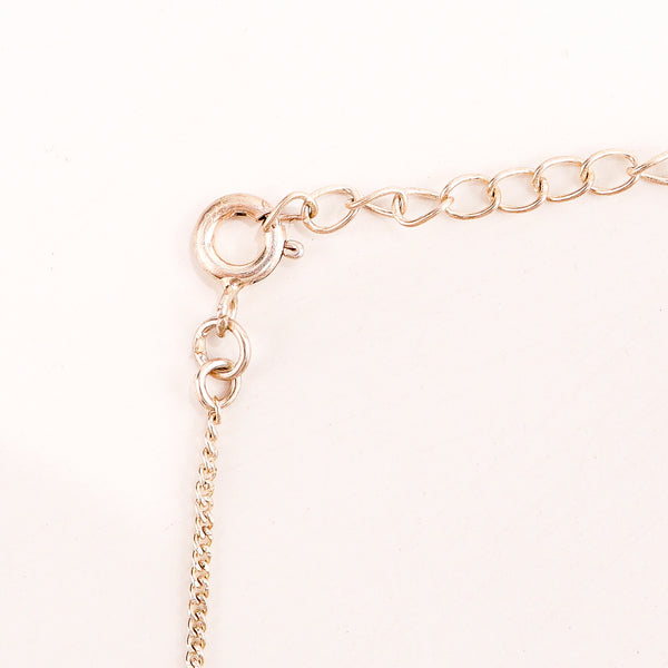 Ahamsmiyoddha silver necklace styled with contemporary outfit
