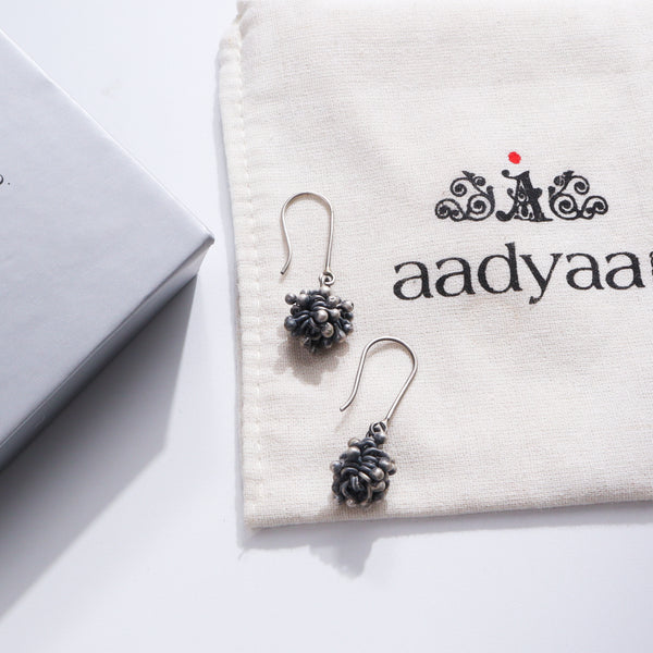 Tiny Ghungroo Bugadi clip-on earrings in sterling silver with delicate ghungroos for elegant occasions