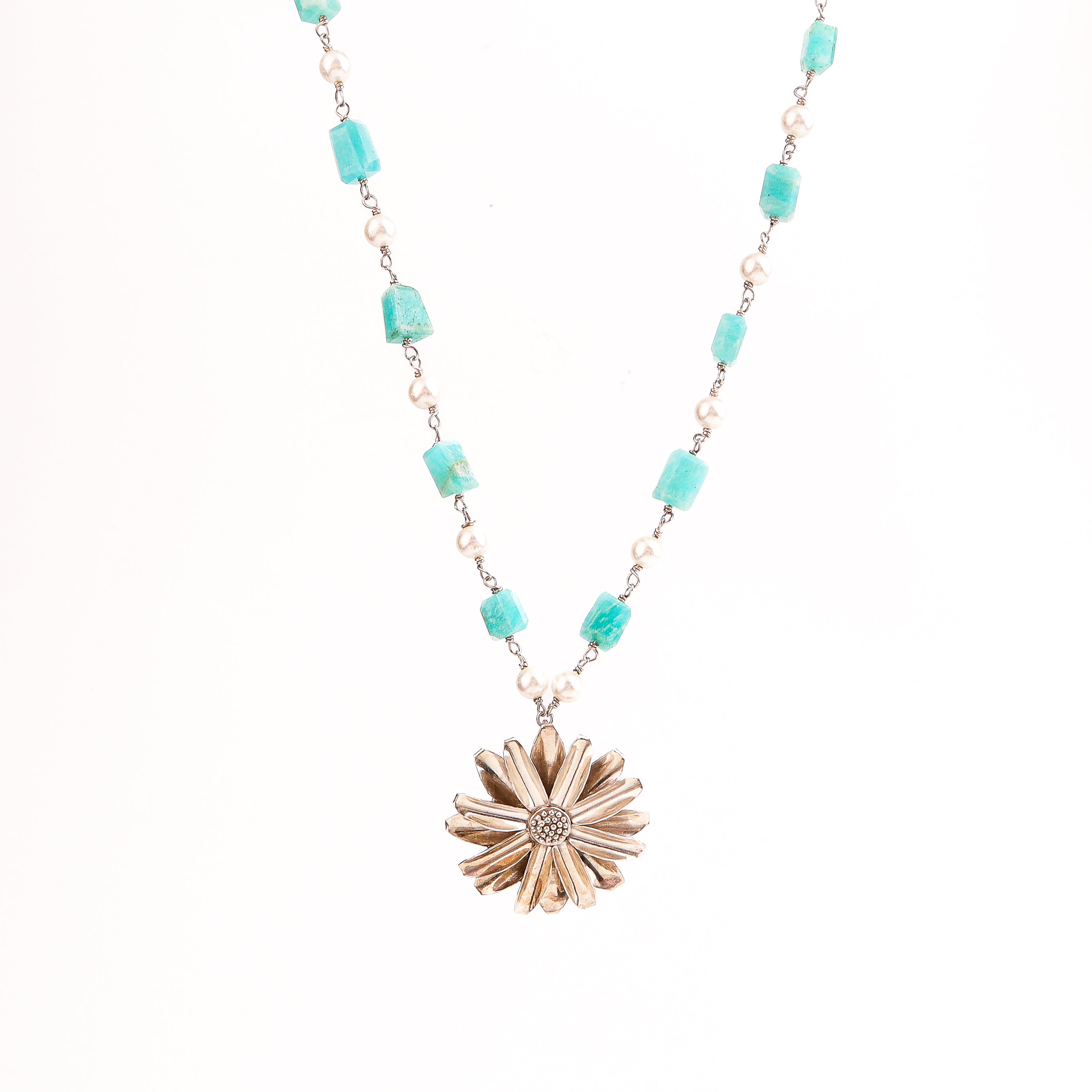 Detail shot of Soorajmukhi motif with blue amazonite stone setting