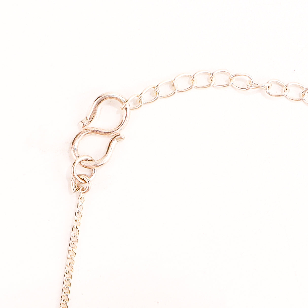 wearing Karmayogi silver necklace for modern styling