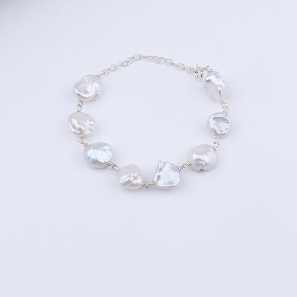 White pearl Ganthan bracelet on white background