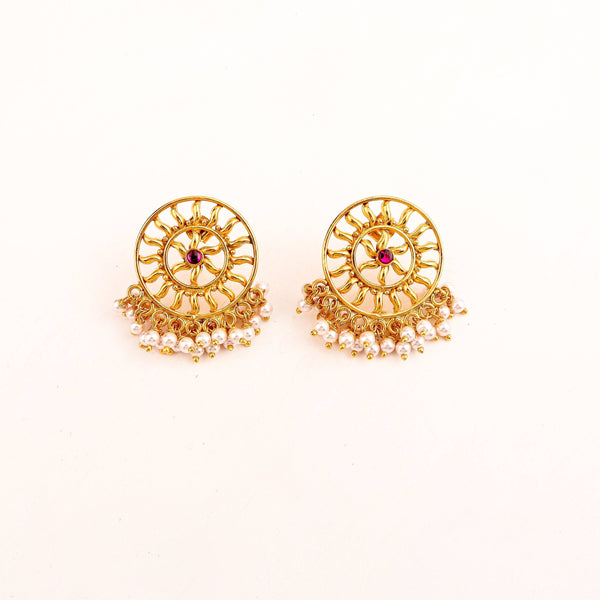 Macro detail of lustrous pearl and textured 22K gold plated 92.5 silver setting