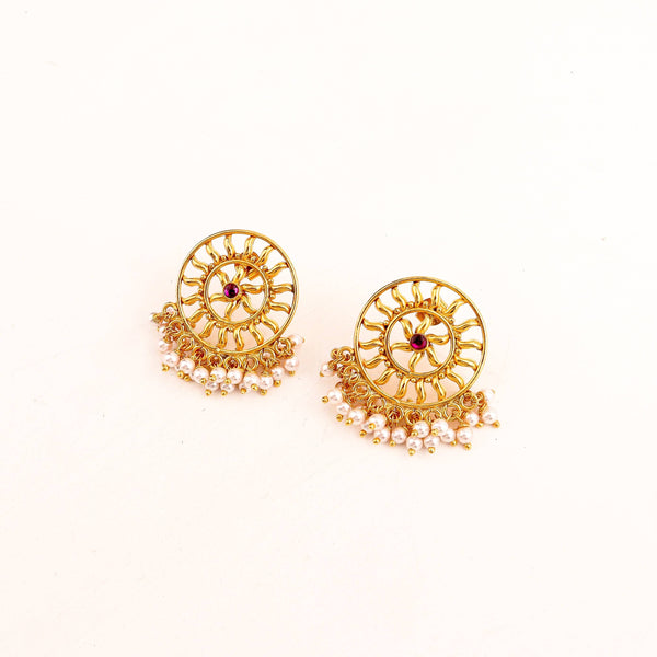 Model wearing Sun Pearl Earrings for festive or wedding jewelry styling