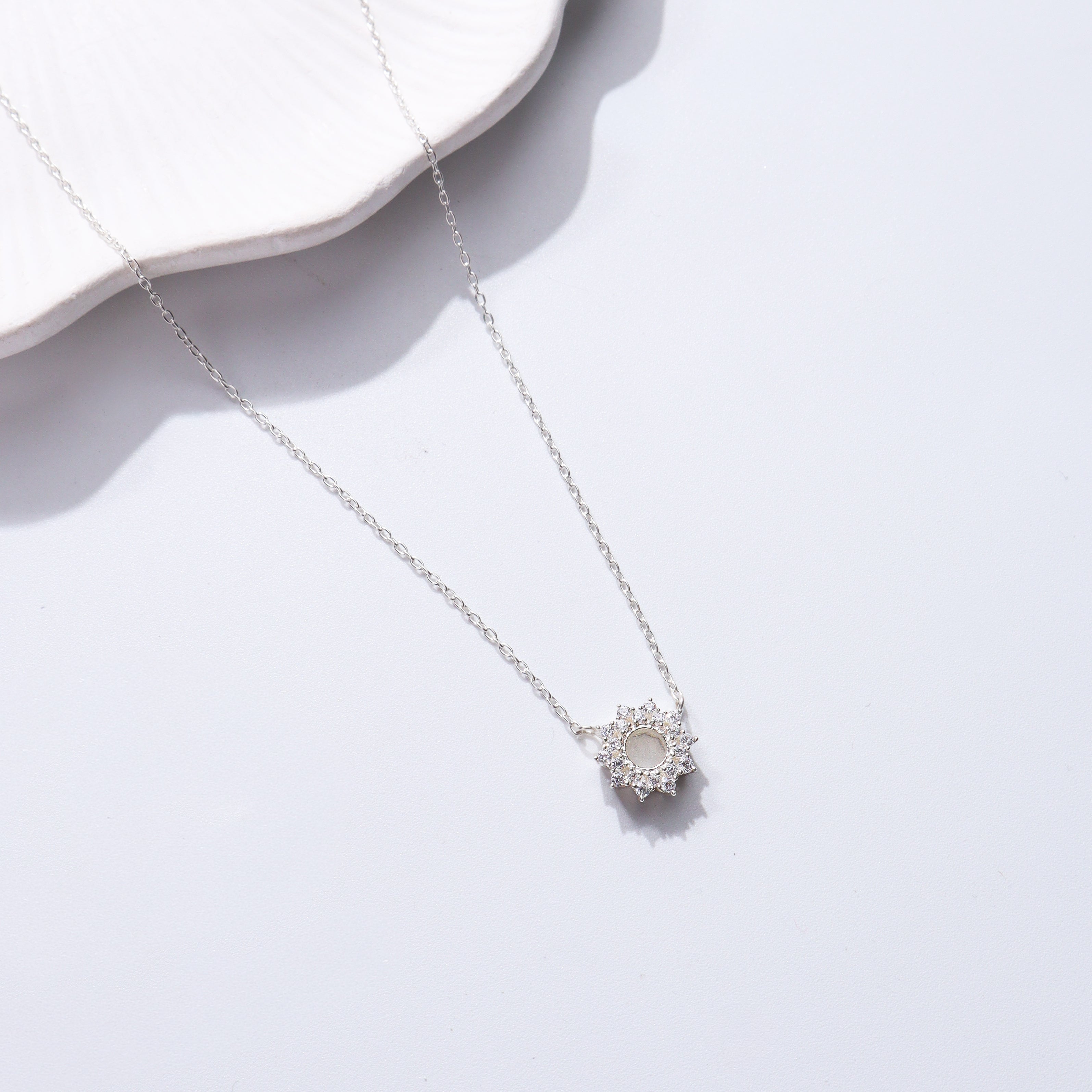 Silver Sunburst Pendant Necklace