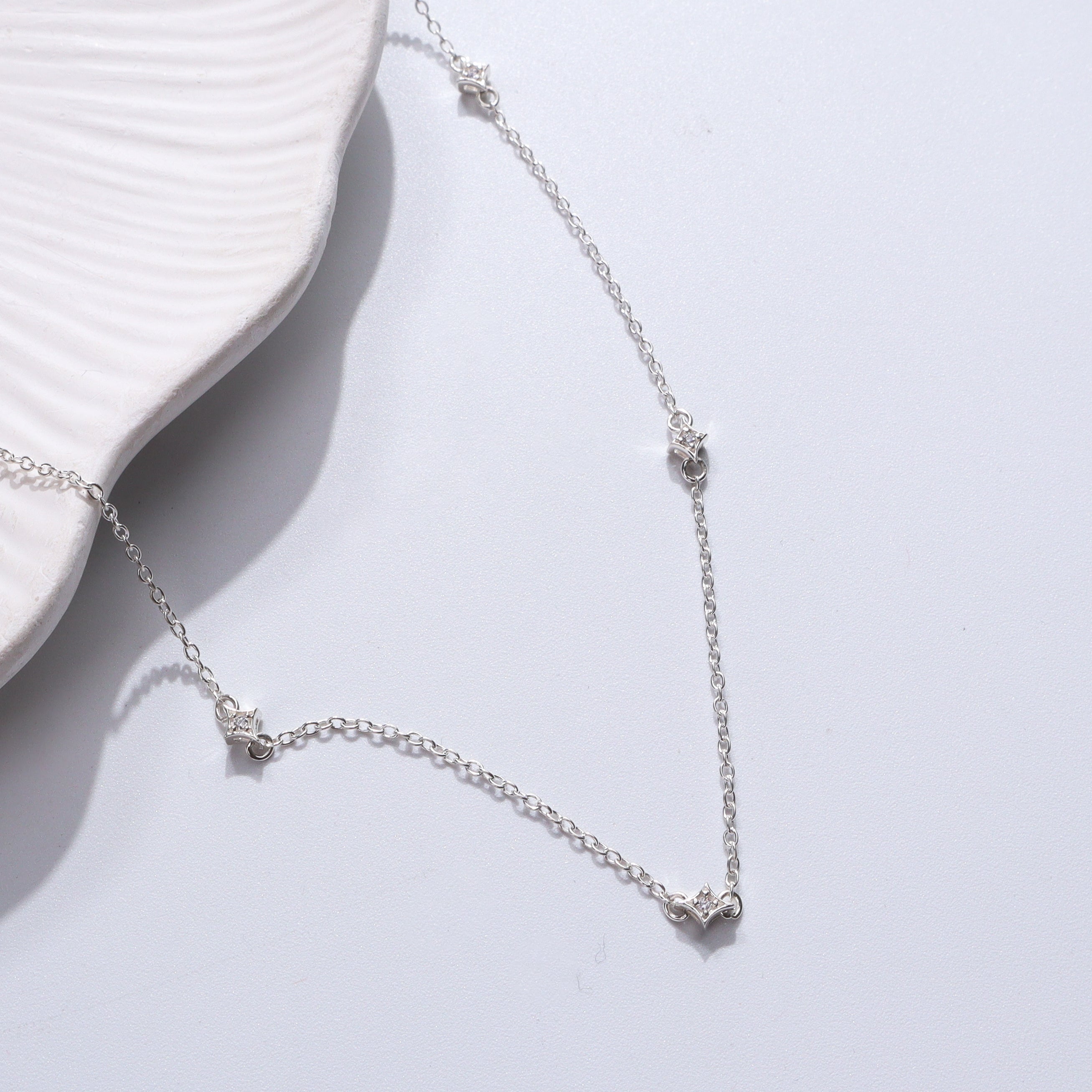 Silver necklace with CZ charms