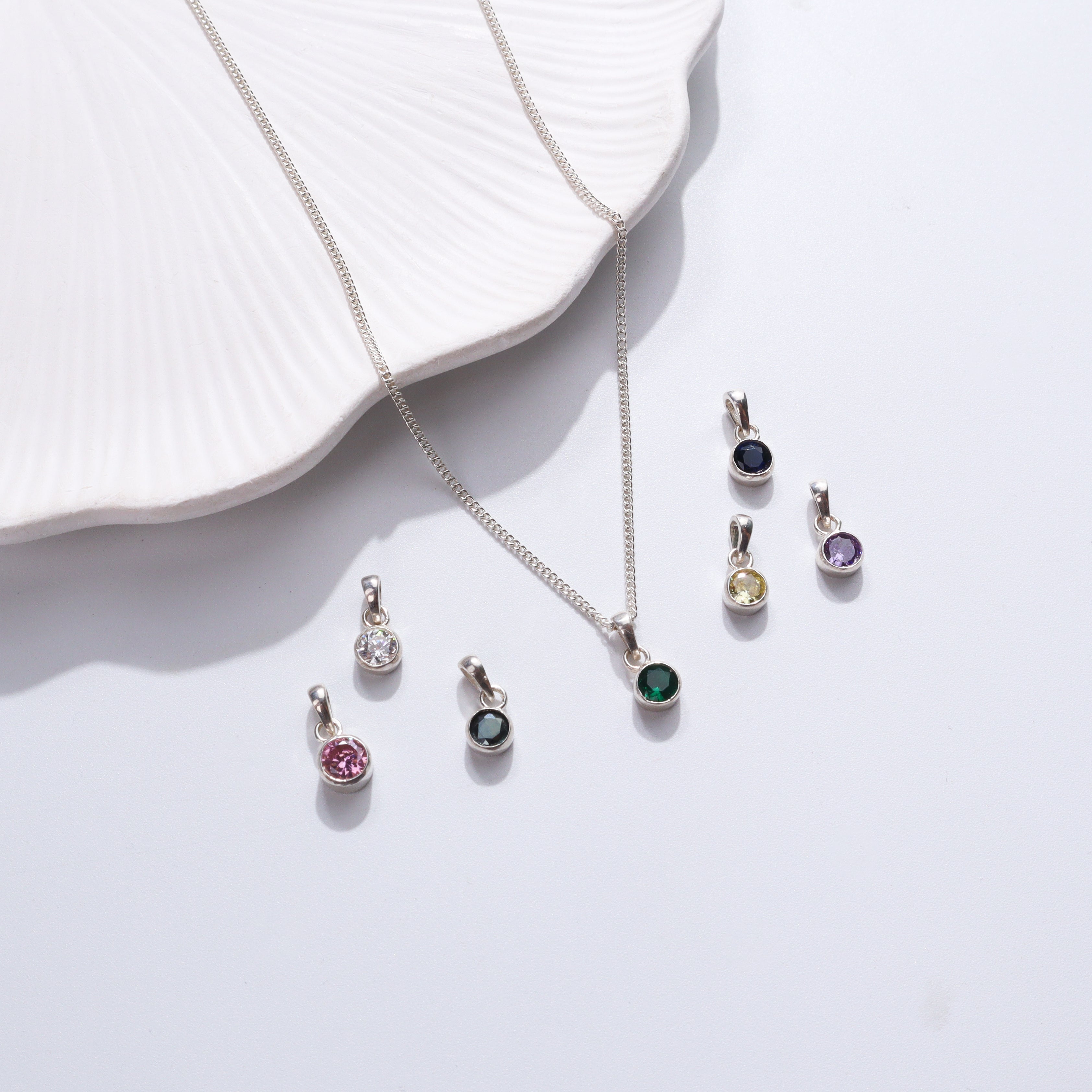 Silver necklace with gemstone pendant