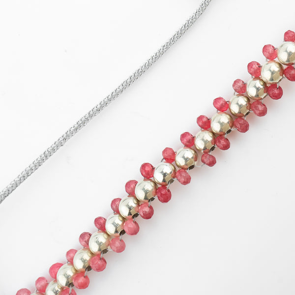 Angled view of Silver Bead Thushi Set with Cherry Quartz