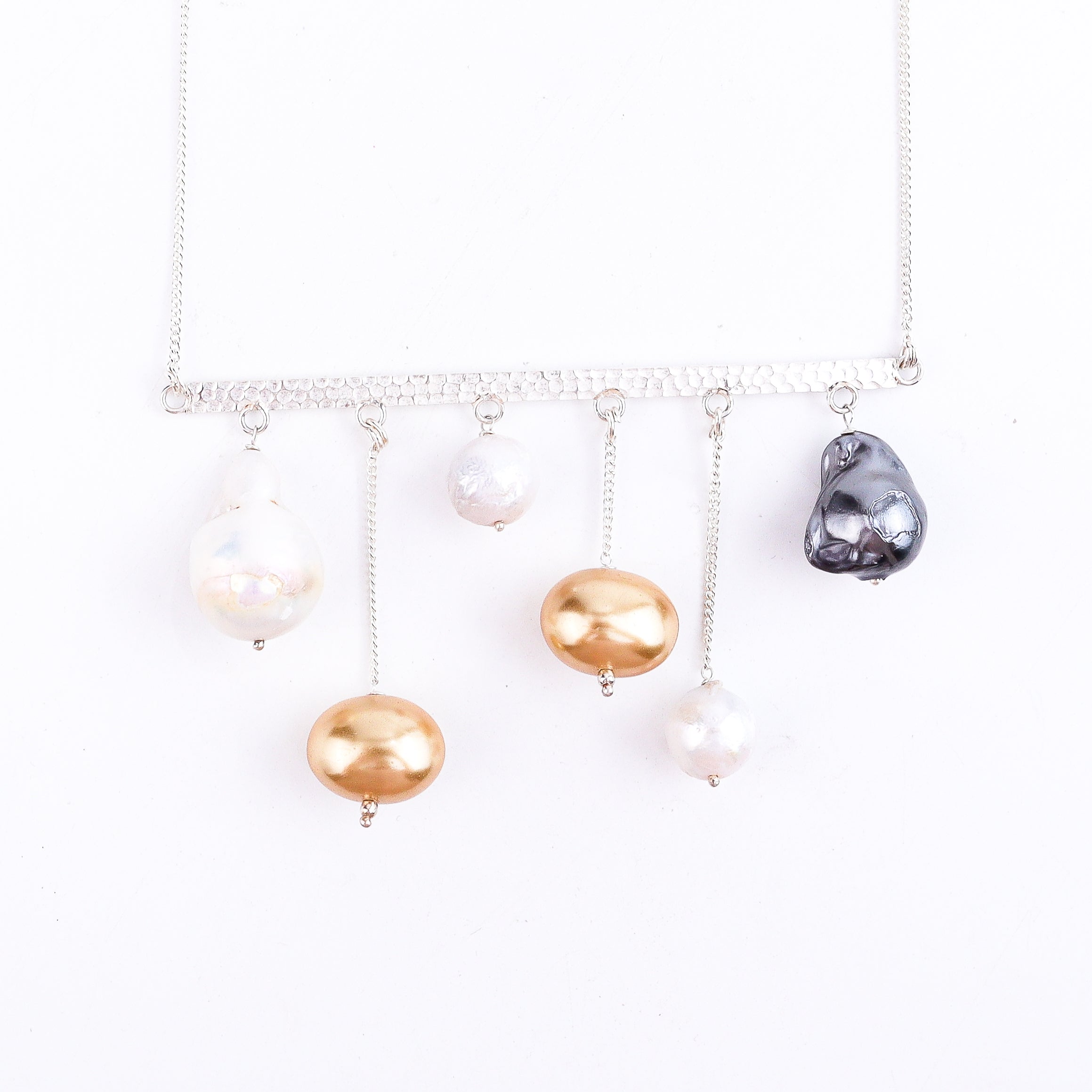pearl detailing on abstract silver necklace