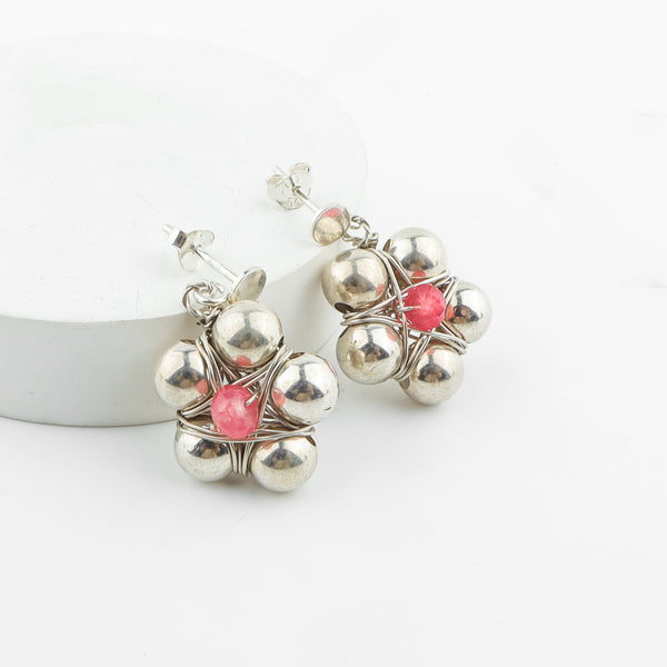 Angled view of Silver Bead Thushi Set with Cherry Quartz